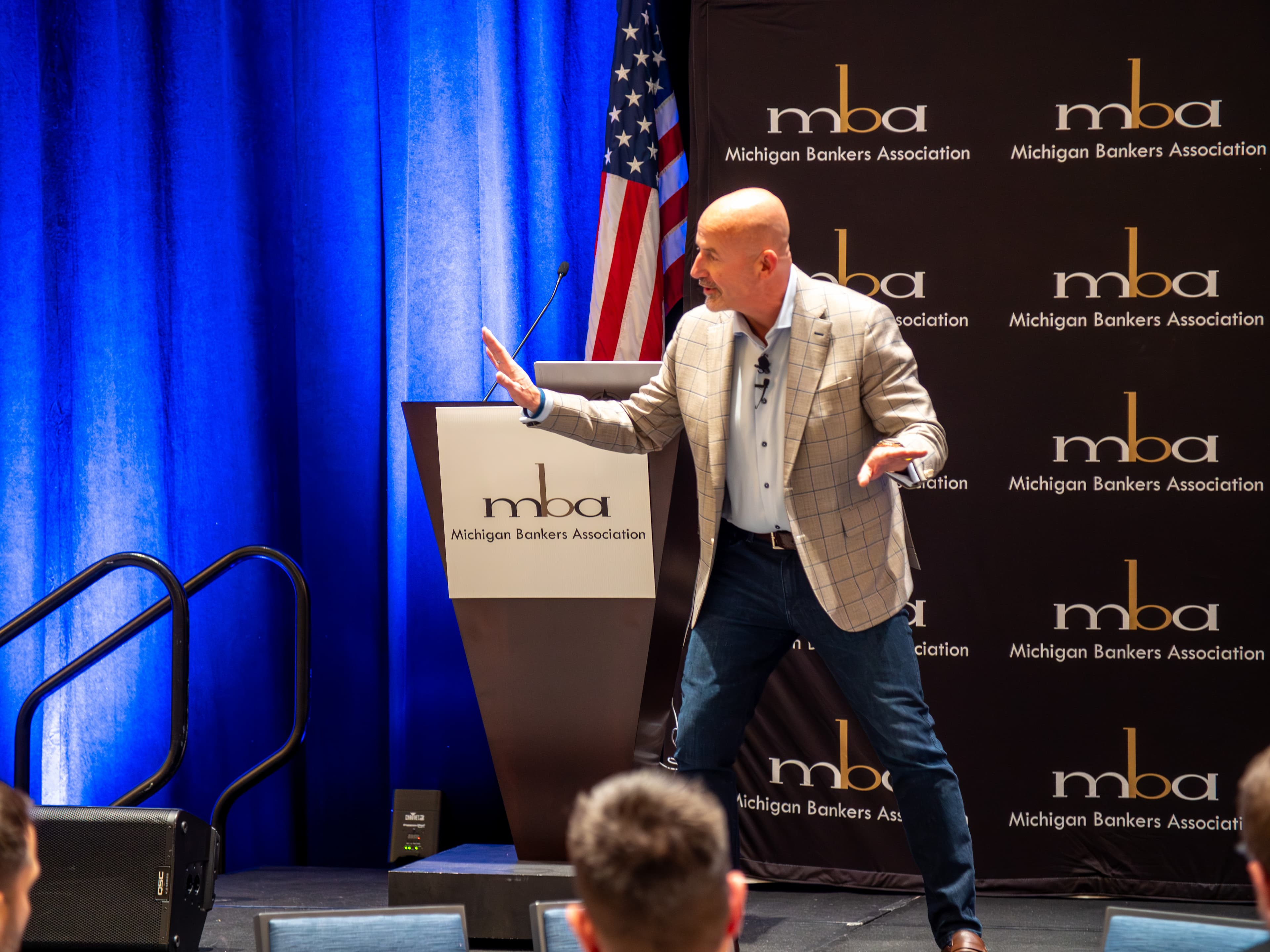 Steve Lowisz on stage at Michigan Bankers Association