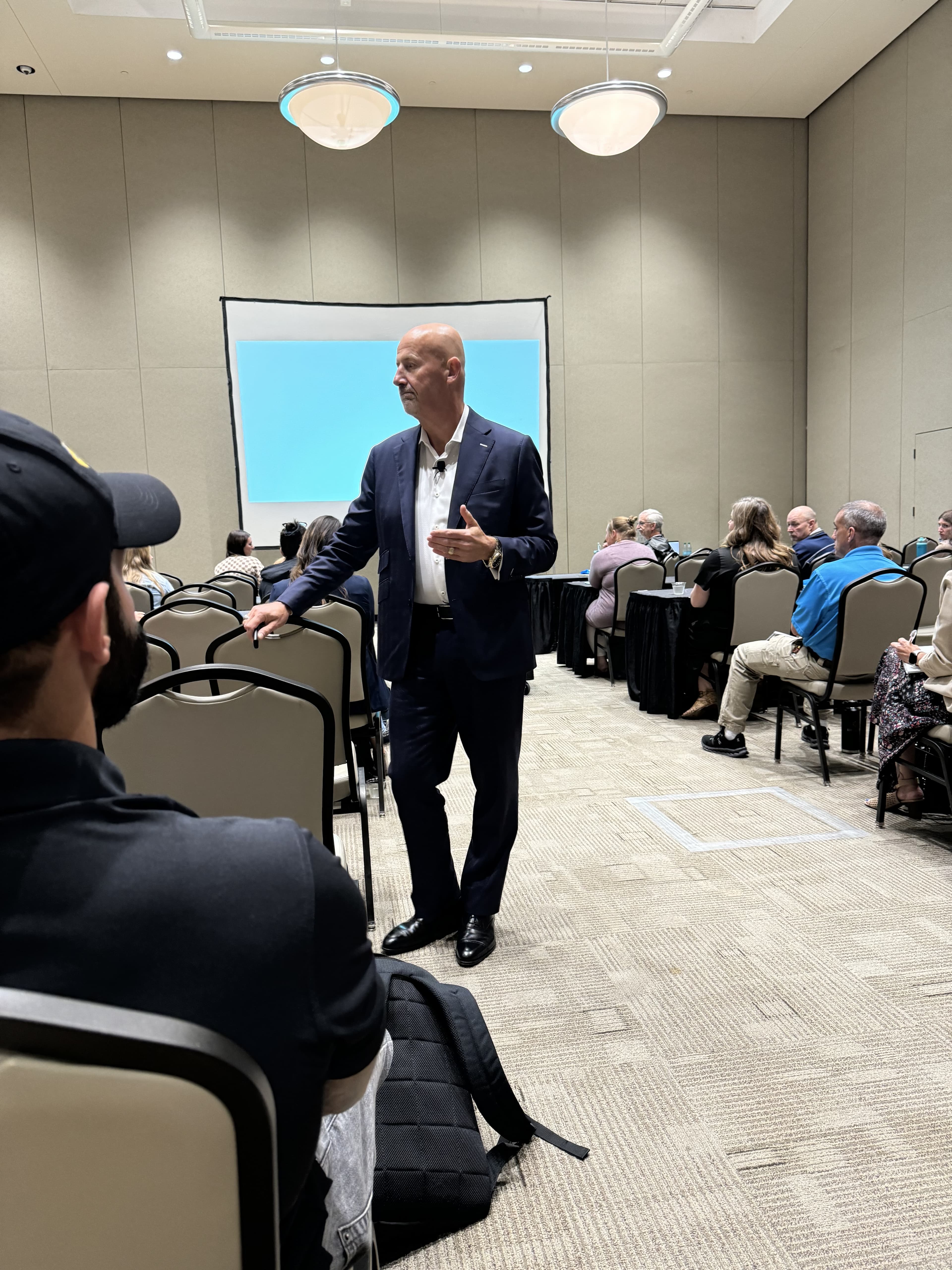 Steve Lowisz speaking at conference