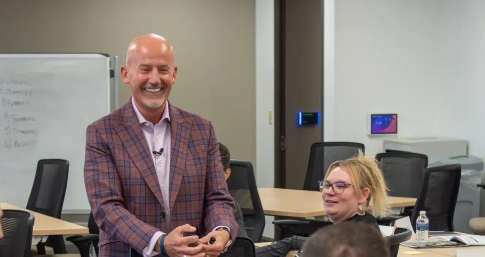 Steve Lowisz sharing a light moment with participants during a workshop